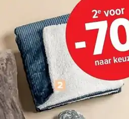 Carrefour Gevoerde plaid met relief sherpa aanbieding