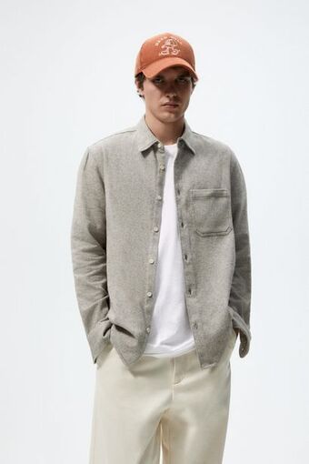 ZARA Camisa com bolso oferta