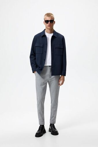 ZARA Calça com textura confort oferta