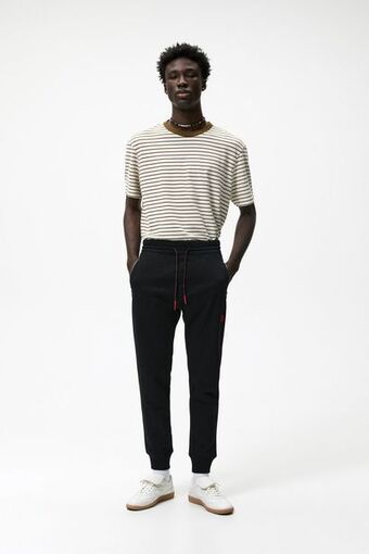 ZARA Calça jogger com zíper oferta