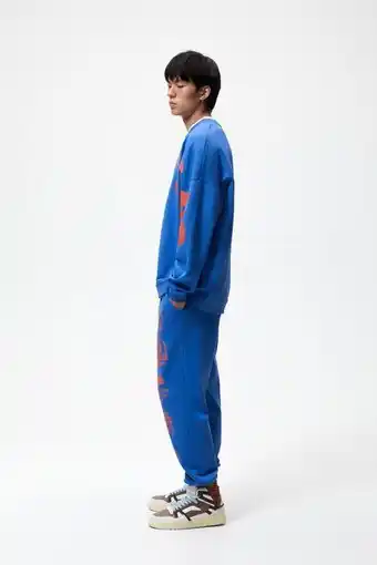 ZARA Calça jogger estampada oferta