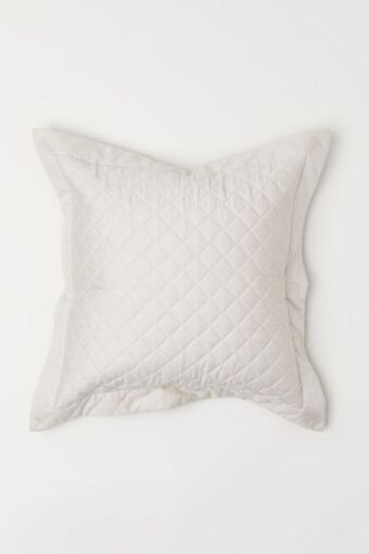 H&M Quilted cushion cover offer