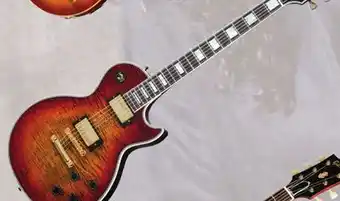 Long & McQuade Gibson custom shop les paul axcess custom ebony fingerboard - bengal burst offer