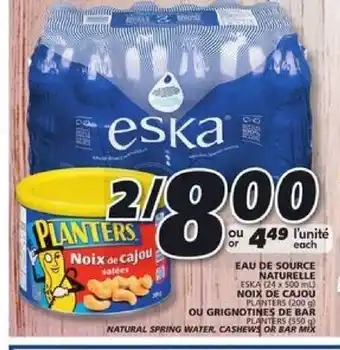 IGA Eska Natural Spring Water, Planters Cashews Or Bar Mix offer