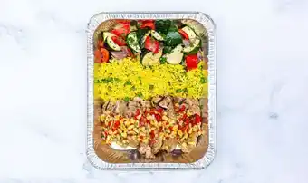 Caribbean jerk chicken with roasted vegetables, basmati rice & salad