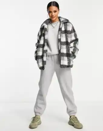 Asos Qed london printed sherpa jacket in monochrome check offer