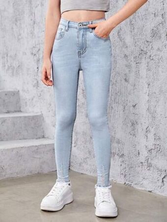 SheIn Girls ripped raw hem skinny jeans offer