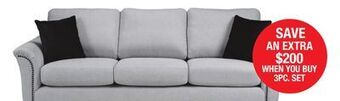 Bad Boy Superstore Fabric sofa with accent pillows offer