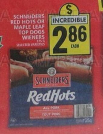 Food Basics SCHNEIDERS RED HOTS OR MAPLE LEAF TOP DOGS WIENERS offer