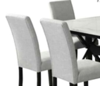 The Brick Verona 7-piece dining package with trestle dining table offer