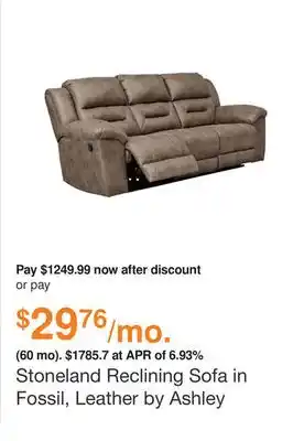Ashley Furniture Stoneland reclining sofa in fossil, leather by ashley offer