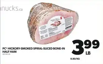 Real Canadian Superstore PC HICKORY-SMOKED SPIRAL-SLICED BONE-IN HALF HAM offer