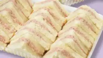 IGA C'est prêt! sandwich platter, stuffed rolls or crescent rolls offer