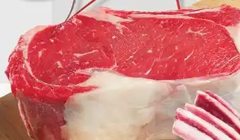 IGA BONE-IN TOMAHAWK RIB STEAK offer