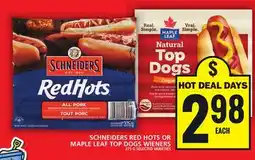 Food Basics SCHNEIDERS RED HOTS OR MAPLE LEAF TOP DOGS WIENERS offer