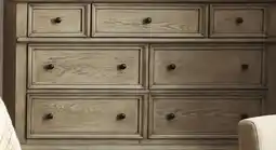 Leon's Emma 7 Drawer Dresser - Oak offer