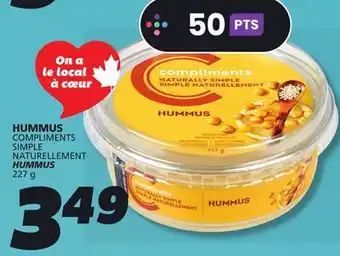 IGA COMPLIMENTS HUMMUS offer