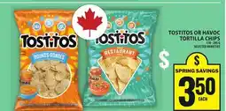 Food Basics TOSTITOS OR HAVOC TORTILLA CHIPS offer