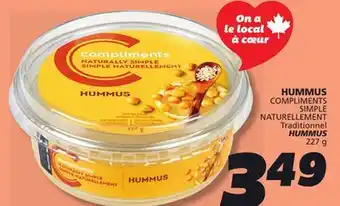 IGA COMPLIMENTS HUMMUS offer