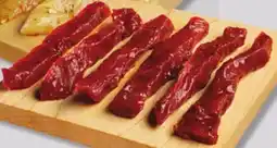 IGA FRESH MARINATED PORK STRIPS offer