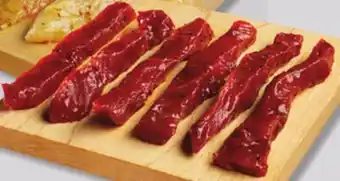 IGA FRESH MARINATED PORK STRIPS offer