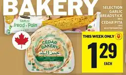 Food Basics SELECTION GARLIC BREADSTICK OR CEDAR PITA offer
