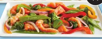 IGA C'EST PRÊT! À CUIRE SALMON OR SHRIMP TRAY WITH VEGETABLES offer
