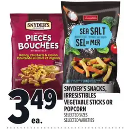 Metro SNYDER'S SNACKS, IRRESISTIBLES VEGETABLE STICKS OR POPCORN offer