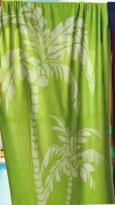 Giant Tiger Velour or striped beach towel offer