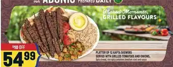 Marché Adonis PLATTER OF 12 KAFTA SKEWERS SERVED WITH GRILLED TOMATOES AND ONIONS offer