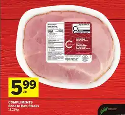 Foodland COMPLIMENTS Bone In Ham Steaks offer