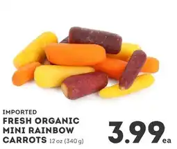 IGA Imported fresh organic mini rainbow carrots offer