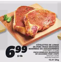 IGA FRESH BONELESS MARINATED OR SEASONED PORK CHOPS offer