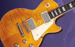 Long & McQuade GIBSON LES PAUL STANDARD 60S FIGURED TOP – HONEY AMBER offer