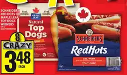 Food Basics SCHNEIDERS RED HOTS OR MAPLE LEAF TOP DOGS WIENERS offer