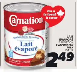 IGA CARNATION EVAPORATED MILK offer