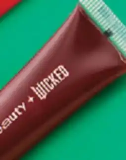 Pharmaprix R.E.M. BEAUTY Wicked For Good Poppy Plumping Lip Gloss Plum Petals offer