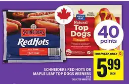Food Basics SCHNEIDERS RED HOTS OR MAPLE LEAF TOP DOGS WIENERS offer