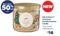 Real Canadian Superstore LIFE AT HOME CINNAMON FIRESIDE SCENTED CANDLE, 14 OZ offer