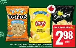 Food Basics LAY'S POTATO CHIPS, TOSTITOS TORTILLA CHIPS OR SMARTFOOD POPCORN offer