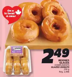 IGA COMPLIMENTS GLAZED DONUTS offer