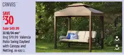 Canadian Tire CANVAS Valencia Patio Swing Daybed with Canopy and Netting offer