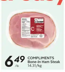 Sobeys COMPLIMENTS Bone-In Ham Steak offer