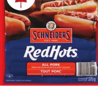 Food Basics SCHNEIDERS RED HOTS OR MAPLE LEAF TOP DOGS WIENERS offer