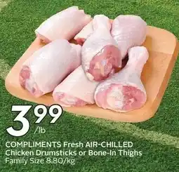 Sobeys Compliments Fresh Air-Chilled Chicken Drumsticks or Bone-In Thighs Family Size offer