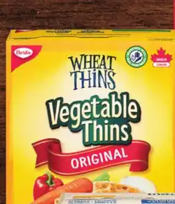 Food Basics CHRISTIE RITZ, WHEAT THINS OR TRISCUIT CRACKERS offer