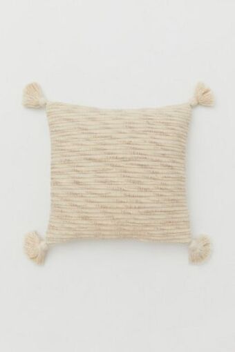 H&M Tasseled cushion cover offer