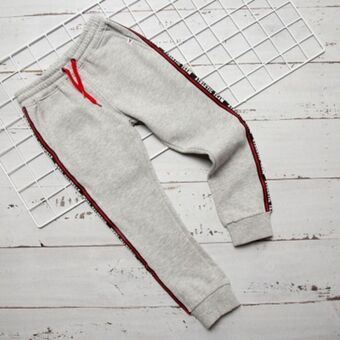 Falabella Pantalón de buzo jogger cintura elásticada algodón afranelado niño oferta