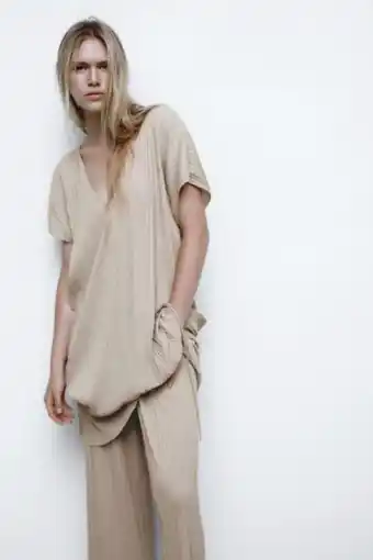 Zara Pantalón ancho plisado oferta
