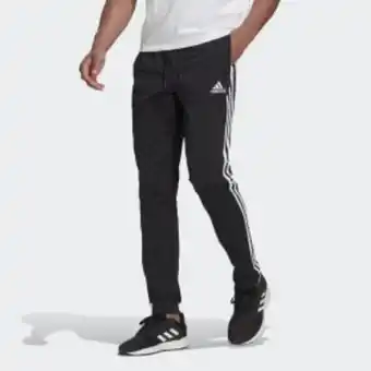 Adidas Pantalón essentials 3 rayas tejido jersey puños abiertos oferta